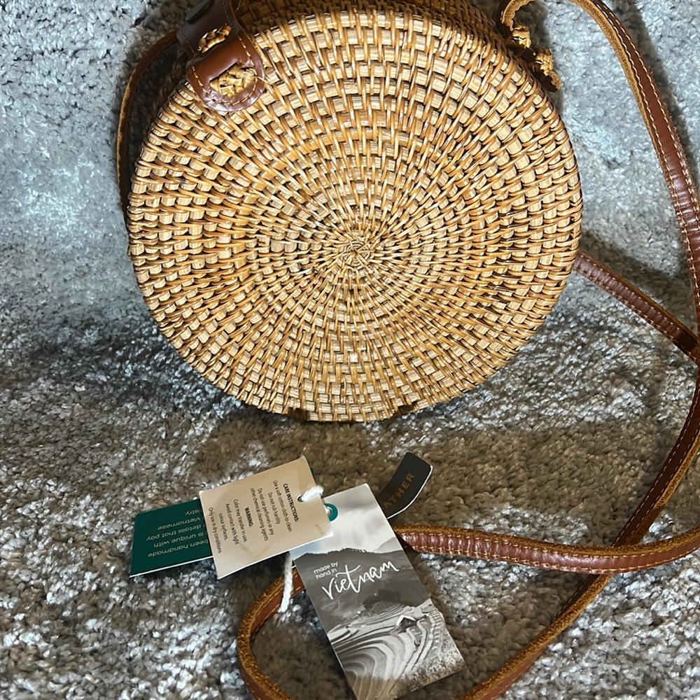 Handmade in Vietnam, made with leather stripes Crossbody bag